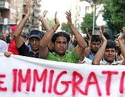 Una protesta di immigrati a Roma (foto Eidon)