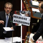 Maroni e Di Pietro. Al centro Zazzera Idv mostra cartello 'Assassino'